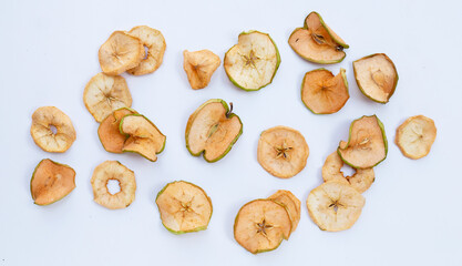 Dried apple slices on white background