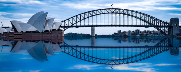 Sydney Harbour Bridge at night NSW Australia reflection in the harbour waters