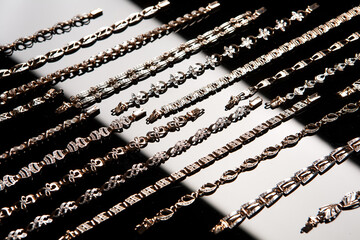 Golden Bracelets On A Glass