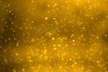 Obraz na płótnie Canvas Yellow glitter vintage lights background. White bokeh on yellow background.
