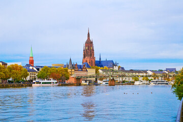 Naklejka premium Frankfurt panoramic view across River Main bridge to skyscrapers Germany.