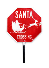 Santa crossing sign with sleigh and reindeer. Hand-held Christmas themed stop sign used for traffic control by crossing guards. Red and white metal texture sign in octagon shape and a pole to hold.