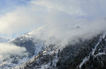 Fototapeta na wymiar Snowy winter mountain panoramic view