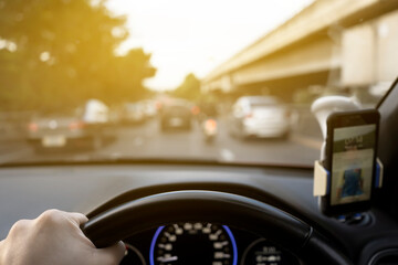 Fototapeta premium man driving car on day time for background usage