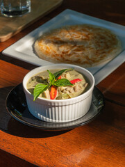 Thai green curry chicken with roti. Thai food.