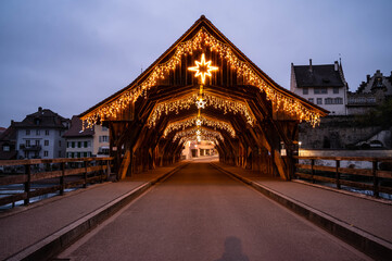 wodden bridge with christmaslights 