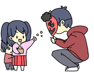 節分の豆まきをする親子