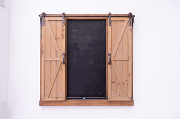 Large blank billboard on a street wall, banners with room to add your own text