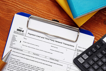 Conceptual photo about Form 1099-K Payment Card and Third Party Network Transactions with written...