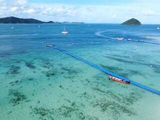 Aerial view of coast beach yacht and ship, Phuket, Thailand.