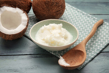 Composition with coconut oil on wooden background