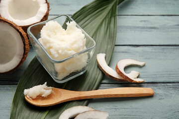 Composition with coconut oil on wooden background