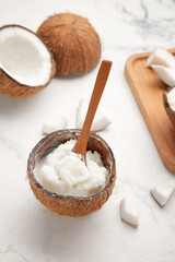 Composition with coconut oil on light background
