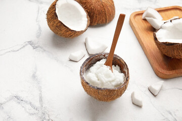 Composition with coconut oil on light background
