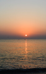 sun, sea and boat view from the beach 8