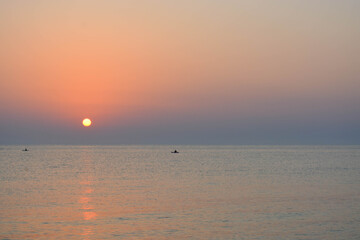 sun, sea and boat view from the beach 3