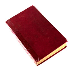 Old vintage book with a red cover isolated on a white background
