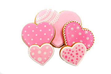 background from pink cookies heart shaped with different patterns, isolated