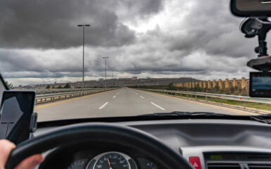 View of road from the car salon, driving auto on highway