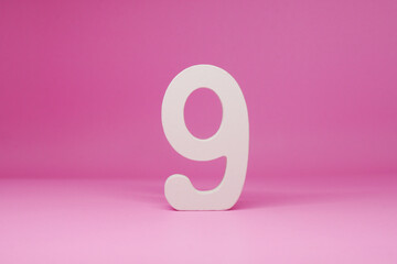 No 9 ( nine ) Isolated pink Background with Copy Space - Number 9% Percentage or Promotion - Discount or anniversary concept                               