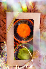 New year's gifts in packs and boxes of different colors. Brilliant compositions among jars and cardboard surprises. Beautiful attractive blanks for the Christmas holiday.