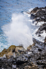 Close shot of Le Souffleur, a natural geyser blowing water in Piton Saint-Leu on Reunion Island