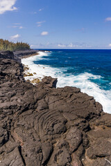 Volcanic landscape and seashore of Jardin Volcanique on Reunion Island 
