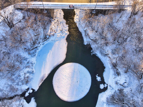 Rotating ice disk on the river (ice carousel in Siberia)