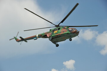 Fototapeta na wymiar Russian military helicopter MI-8 in the sky