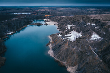 Aerial view to Konduki (Romantsevkie Gory or Romantsevo hills) in Tula region, Russia in early winter with dramatic sky in twilights 