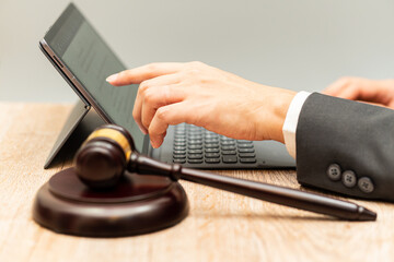 Digital transformation in legal profession: Wooden gavel was placed as the subject, judge or lawyer...