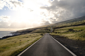 a road next to the water