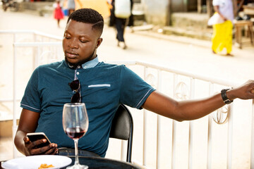 handsome young man using a mobile phone