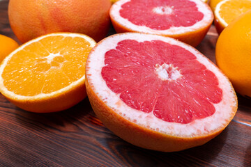 Fototapeta na wymiar citrus mix. lemon, grapefruit, arails whole and halves