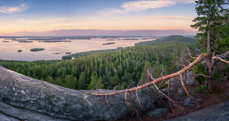 Scenic landscape with lake and sunset at evening in Koli, national park, Finland - 397391756
