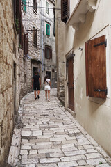 Fototapeta na wymiar Architecture of old town and picturesque harbour of Sibenik, Croatia, Europe