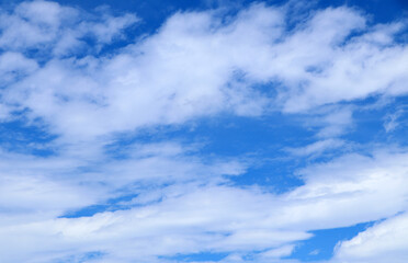 Naklejka na ściany i meble Blue sky background with clouds, White clouds floating on blue sky for backgrounds concept