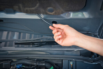 Auto mechanic checking car engine,worker