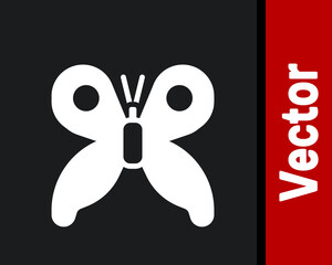 Obraz premium White Butterfly icon isolated on black background. Vector.