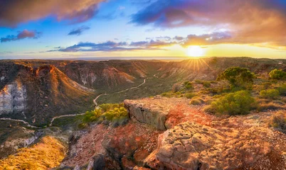 Fototapeten panorama view of sunrise over charles knife canyon, western australia © Christian B.