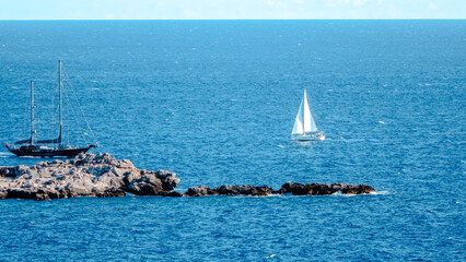 Sailing boats in the Adriatic Sea. Distant shot of the sailing boat in the Adriatic Sea shot in Dubrovnik