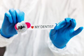 Dentist Holding Motivational Quote During Epidemic Time