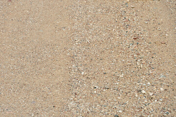 Empty background. Small stones or pebbles. Dirt village road. A dry, sun-baked land with no joy or happiness in your personal life.