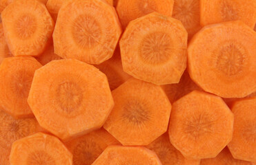 Background of sliced orange carrots