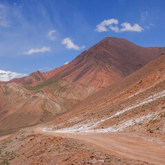 Fototapeta premium Landscape view of high altitude Pamir Highway at Kyzyl Art pass in Trans Alay or Trans Alai range between borders of Kyrgyzstan and Tajikistan