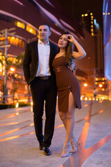 Portrait of couple outdoors at night in the city at Bangkok Thailand