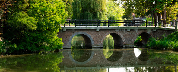 Fototapeta na wymiar Stone bow bridge in Goes, The Netherlands