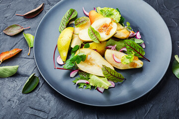 Autumn salad with pear.