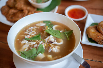 Steam squid with spicy sauce.