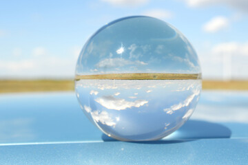 Summer landscape inside the glass globe